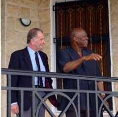 President Kabbah chatting with one of the MPs