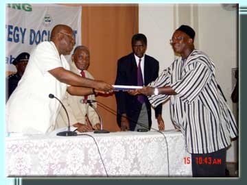 J.B. Dauda Minister of Finance presenting the strategy document to President Kabbah 