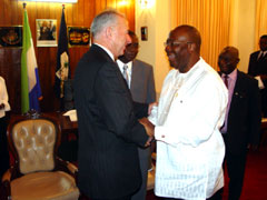President Kabbah in handshake with Rt. Hon.Don McKinnon 