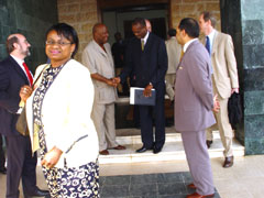 President Kabbah in handshake with a Sierra Leonean member of the UK trade delegation, Reginald Leopold