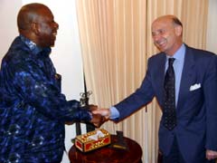 President Kabbah in handshake with SALCOST Area Manager Mr. Christian Fabio Capitanio