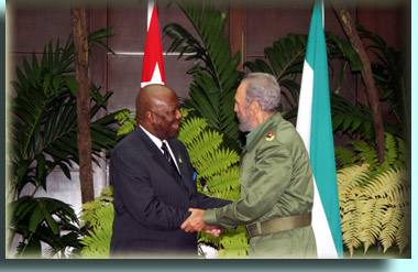 President Kabbah in handshake with President Fidel Castro