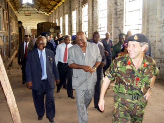 Col. Steve Davies leading President Kabbah and Vice President Berewa on  tour