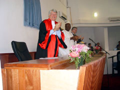 Standing ovation for the choir of the Milton Margai School for the blind. At the high table are Justice Geoffrey Robertson QC, President of the Special Court, President Kabbah and Mr. Hans  Corell