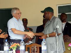 President Kabbah receives the keys of the newly-rehabilitated Koidu Government Hospital from U.S.A. Ambassador to Sierra Leone, Peter Chaveas