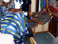 Temne women embracing President Kabbah